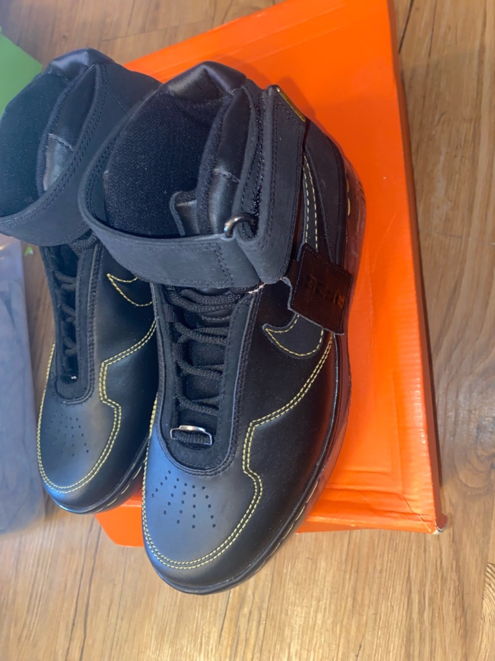 Nike Black High-Top Sneakers with Yellow Stitching